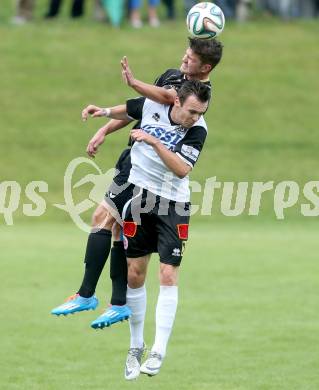 Fussball Kaerntner Liga. Koettmannsdorf gegen SV Spittal. Daniel Globotschnig,  (Koettmannsdorf), Thomas Lagler (Spittal). Koettmannsdorf, am 27.7.2014.
Foto: Kuess
---
pressefotos, pressefotografie, kuess, qs, qspictures, sport, bild, bilder, bilddatenbank