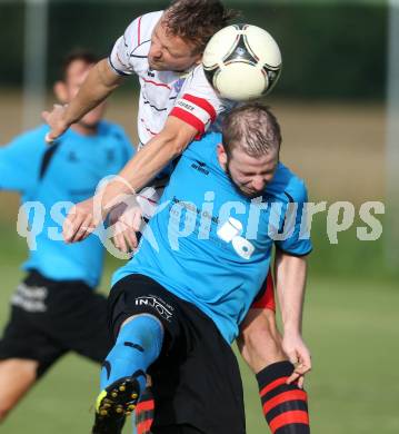 Fussball. Unterliga Ost. SG Magdalensberg/Eberndorfer AC gegen SPG FC Poggersdorf KM. Danijel Josimovic, (Magdalensberg), Gunter Josef Bierbaumer  (Poggersdorf). Pischeldorf, am 26.7.2014.
Foto: Kuess
---
pressefotos, pressefotografie, kuess, qs, qspictures, sport, bild, bilder, bilddatenbank