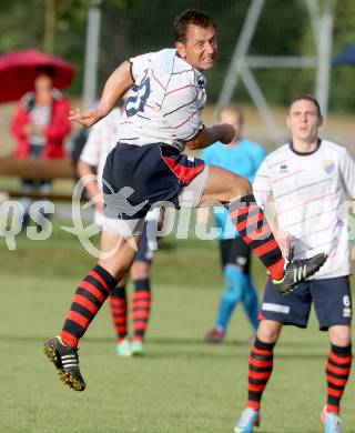 Fussball. Unterliga Ost. SG Magdalensberg/Eberndorfer AC gegen SPG FC Poggersdorf KM.  Florin Orga (Poggersdorf). Pischeldorf, am 26.7.2014.
Foto: Kuess
---
pressefotos, pressefotografie, kuess, qs, qspictures, sport, bild, bilder, bilddatenbank