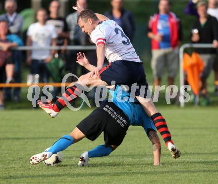 Fussball. Unterliga Ost. SG Magdalensberg/Eberndorfer AC gegen SPG FC Poggersdorf KM. Kai Schoppitsch, (Magdalensberg), Gunther Josef Bierbaumer  (Poggersdorf). Pischeldorf, am 26.7.2014.
Foto: Kuess
---
pressefotos, pressefotografie, kuess, qs, qspictures, sport, bild, bilder, bilddatenbank