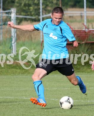 Fussball. Unterliga Ost. SG Magdalensberg/Eberndorfer AC gegen SPG FC Poggersdorf KM. Martin Poeck (Magdalensberg). Pischeldorf, am 26.7.2014.
Foto: Kuess
---
pressefotos, pressefotografie, kuess, qs, qspictures, sport, bild, bilder, bilddatenbank