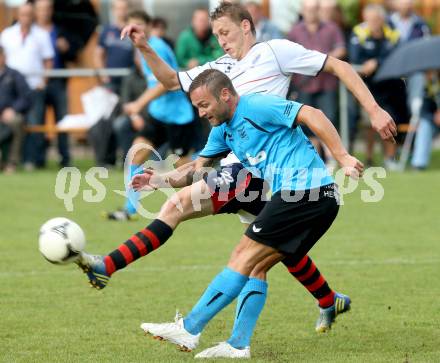 Fussball. Unterliga Ost. SG Magdalensberg/Eberndorfer AC gegen SPG FC Poggersdorf KM.  Kai Schoppitsch, (Magdalensberg), Ziga Bokal  (Poggersdorf). Pischeldorf, am 26.7.2014.
Foto: Kuess
---
pressefotos, pressefotografie, kuess, qs, qspictures, sport, bild, bilder, bilddatenbank