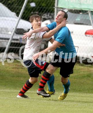 Fussball. Unterliga Ost. SG Magdalensberg/Eberndorfer AC gegen SPG FC Poggersdorf KM. Christoph Floredo,  (Magdalensberg), Gerhard Krumpl (Poggersdorf). Pischeldorf, am 26.7.2014.
Foto: Kuess
---
pressefotos, pressefotografie, kuess, qs, qspictures, sport, bild, bilder, bilddatenbank