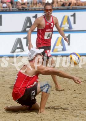 Beachvolleyball Grand Slam. Joerg Wutzl, Daniel Muellner  (AUT). Klagenfurt, 30.7.2014.
Foto: Kuess
---
pressefotos, pressefotografie, kuess, qs, qspictures, sport, bild, bilder, bilddatenbank