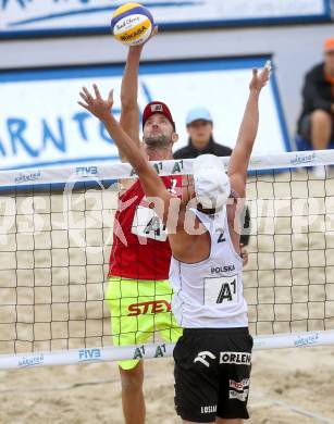 Beachvolleyball Grand Slam.   Clemens Doppler (AUT), Bartosz Losiak (POL). Klagenfurt, 31.7.2014.
Foto: Kuess

---
pressefotos, pressefotografie, kuess, qs, qspictures, sport, bild, bilder, bilddatenbank