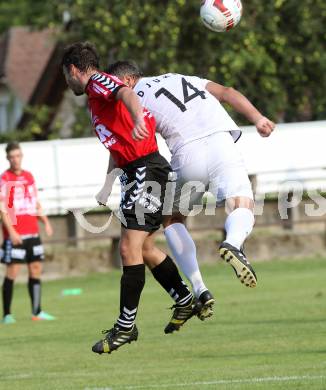 Fussball. Kaerntner Liga. Atus Ferlach gegen SV Feldkirchen/SV Oberglan. Darko Djukic (Ferlach), Patrick Rene Striednig (SV Feldkirchen/SV Oberglan). Ferlach, 2.8.2014.
Foto: Kuess
---
pressefotos, pressefotografie, kuess, qs, qspictures, sport, bild, bilder, bilddatenbank