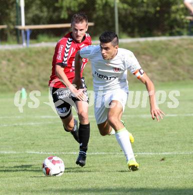 Fussball. Kaerntner Liga. Atus Ferlach gegen SV Feldkirchen/SV Oberglan. Lukas Jaklitsch (Ferlach), Josef Hudelist (SV Feldkirchen/SV Oberglan). Ferlach, 2.8.2014.
Foto: Kuess
---
pressefotos, pressefotografie, kuess, qs, qspictures, sport, bild, bilder, bilddatenbank