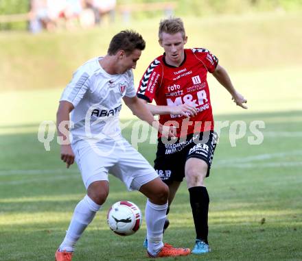 Fussball. Kaerntner Liga. Atus Ferlach gegen SV Feldkirchen/SV Oberglan. Thomas Ogris (Ferlach), Michael Wernig (SV Feldkirchen/SV Oberglan). Ferlach, 2.8.2014.
Foto: Kuess
---
pressefotos, pressefotografie, kuess, qs, qspictures, sport, bild, bilder, bilddatenbank