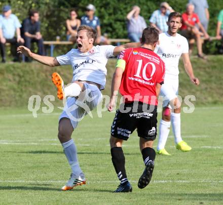 Fussball. Kaerntner Liga. Atus Ferlach gegen SV Feldkirchen/SV Oberglan. Martin Trattnig (Ferlach), Mathias Regal (SV Feldkirchen/SV Oberglan). Ferlach, 2.8.2014.
Foto: Kuess
---
pressefotos, pressefotografie, kuess, qs, qspictures, sport, bild, bilder, bilddatenbank