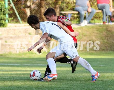 Fussball. Kaerntner Liga. Atus Ferlach gegen SV Feldkirchen/SV Oberglan. Martin Sustersic (Ferlach), Mathias Regal (SV Feldkirchen/SV Oberglan). Ferlach, 2.8.2014.
Foto: Kuess
---
pressefotos, pressefotografie, kuess, qs, qspictures, sport, bild, bilder, bilddatenbank