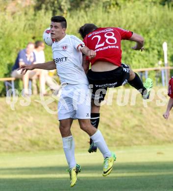 Fussball. Kaerntner Liga. Atus Ferlach gegen SV Feldkirchen/SV Oberglan. Lukas Jaklitsch (Ferlach), Florian Hausdorfer (SV Feldkirchen/SV Oberglan). Ferlach, 2.8.2014.
Foto: Kuess
---
pressefotos, pressefotografie, kuess, qs, qspictures, sport, bild, bilder, bilddatenbank