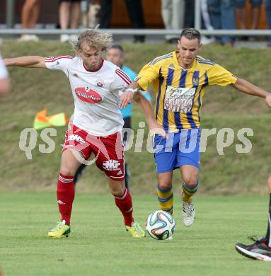 Fussball Unterliga Ost. Ludmannsdorf gegen Liebenfels. Dejan Smeh,  (Ludmannsdorf), Stefan Stampfer (Liebenfels). Ludmannsdorf, 3.8.2014.
Foto: Kuess
---
pressefotos, pressefotografie, kuess, qs, qspictures, sport, bild, bilder, bilddatenbank