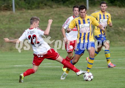 Fussball Unterliga Ost. Ludmannsdorf gegen Liebenfels. Michael Krainer, (Ludmannsdorf), Christoph Freithofnig  (Liebenfels). Ludmannsdorf, 3.8.2014.
Foto: Kuess
---
pressefotos, pressefotografie, kuess, qs, qspictures, sport, bild, bilder, bilddatenbank