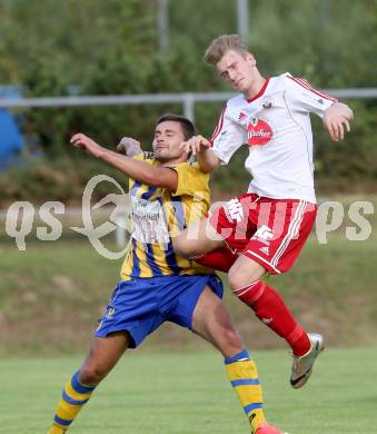 Fussball Unterliga Ost. Ludmannsdorf gegen Liebenfels. Michael Krainer,  (Ludmannsdorf), Simon Kienberger (Liebenfels). Ludmannsdorf, 3.8.2014.
Foto: Kuess
---
pressefotos, pressefotografie, kuess, qs, qspictures, sport, bild, bilder, bilddatenbank