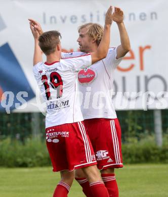 Fussball Unterliga Ost. Ludmannsdorf gegen Liebenfels. Torjubel Dejan Smeh, Markus Partl (Ludmannsdorf). Ludmannsdorf, 3.8.2014.
Foto: Kuess
---
pressefotos, pressefotografie, kuess, qs, qspictures, sport, bild, bilder, bilddatenbank