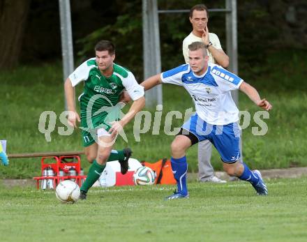 Fussball 1. Klasse C2. HSV gegen Ebental. Mario Krall, (HSV),  Stefan Jachs  (Ebental). Lendorf, am 2.8.2014.
Foto: Kuess
---
pressefotos, pressefotografie, kuess, qs, qspictures, sport, bild, bilder, bilddatenbank