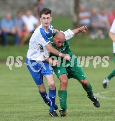 Fussball 1. Klasse C2. HSV gegen Ebental. Markus Huber, (HSV),  Daniel Kolbitsch  (Ebental). Lendorf, am 2.8.2014.
Foto: Kuess
---
pressefotos, pressefotografie, kuess, qs, qspictures, sport, bild, bilder, bilddatenbank