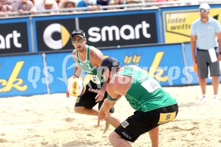 Beachvolleyball Grand Slam. Alison Conte Cerutti, Bruno Oscar Schmidt (BRA). Klagenfurt, 3.8.2014.
Foto: Kuess

---
pressefotos, pressefotografie, kuess, qs, qspictures, sport, bild, bilder, bilddatenbank