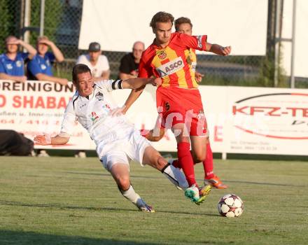 Fussball Regionalliga. ATSV Wolfsberg gegen WAC Amateure. Patrick Marzi,  (ATSV), Patrick Pfennich (WAC Amateure). Wolfsberg, 8.8.2014.
Foto: Kuess
---
pressefotos, pressefotografie, kuess, qs, qspictures, sport, bild, bilder, bilddatenbank