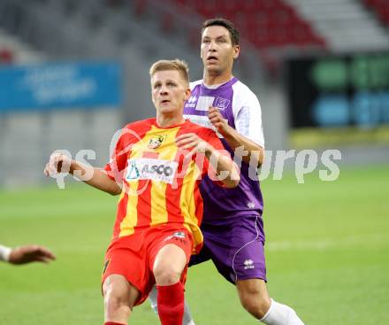 Fussball Regionalliga. Austria Klagenfurt gegen ATSV Wolfsberg. Bernd Kager (Austria Klagenfurt), Jonas Warmuth (ATSV). Wolfsberg, 8.8.2014.
Foto: Kuess
---
pressefotos, pressefotografie, kuess, qs, qspictures, sport, bild, bilder, bilddatenbank