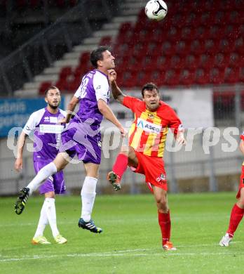 Fussball Regionalliga. Austria Klagenfurt gegen ATSV Wolfsberg. Bernd Kager (Austria Klagenfurt), Michael Kirisits (ATSV). Wolfsberg, 8.8.2014.
Foto: Kuess
---
pressefotos, pressefotografie, kuess, qs, qspictures, sport, bild, bilder, bilddatenbank