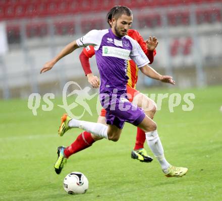 Fussball Regionalliga. Austria Klagenfurt gegen ATSV Wolfsberg. Ali Hamdemir (Austria Klagenfurt), Philipp Sattler (ATSV). Wolfsberg, 8.8.2014.
Foto: Kuess
---
pressefotos, pressefotografie, kuess, qs, qspictures, sport, bild, bilder, bilddatenbank