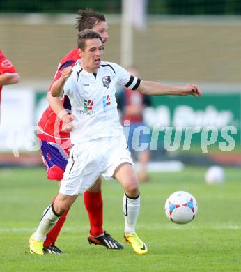 Fussball Regionalliga. RZ Pellets WAC Amateure gegen SAK. Patrick Pfennich,  (WAC), Patrick Lausegger (SAK). Wolfsberg, 17.8.2014.
Foto: Kuess
---
pressefotos, pressefotografie, kuess, qs, qspictures, sport, bild, bilder, bilddatenbank