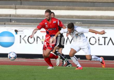 Fussball Regionalliga. RZ Pellets WAC Amateure gegen SAK. Julian Salentinig, (WAC), Marjan Kropiunik (SAK). Wolfsberg, 17.8.2014.
Foto: Kuess
---
pressefotos, pressefotografie, kuess, qs, qspictures, sport, bild, bilder, bilddatenbank