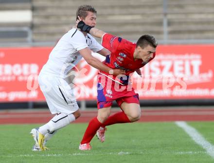 Fussball Regionalliga. RZ Pellets WAC Amateure gegen SAK. Daniel Rechberger, (WAC), Tadej Zagar-Knez  (SAK). Wolfsberg, 17.8.2014.
Foto: Kuess
---
pressefotos, pressefotografie, kuess, qs, qspictures, sport, bild, bilder, bilddatenbank