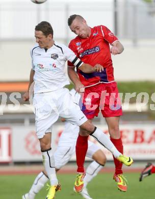 Fussball Regionalliga. RZ Pellets WAC Amateure gegen SAK. Patrick Pfennich, (WAC), Aleksandar Kocic (SAK). Wolfsberg, 17.8.2014.
Foto: Kuess
---
pressefotos, pressefotografie, kuess, qs, qspictures, sport, bild, bilder, bilddatenbank