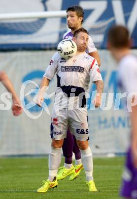 Fussball Regionalliga. SAK gegen SK Auustria Klagenfurt. Darijo Biscan,  (SAK), Marko Dusak (Austria Klagenfurt). Welzenegg, am 22.8.2014.
Foto: Kuess
---
pressefotos, pressefotografie, kuess, qs, qspictures, sport, bild, bilder, bilddatenbank