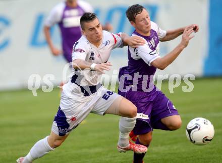 Fussball Regionalliga. SAK gegen SK Auustria Klagenfurt. Tadej Zagar Knez, (SAK), Fabian Miesenboeck (Austria Klagenfurt). Welzenegg, am 22.8.2014.
Foto: Kuess
---
pressefotos, pressefotografie, kuess, qs, qspictures, sport, bild, bilder, bilddatenbank