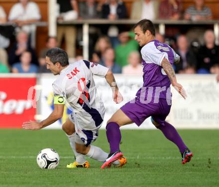 Fussball Regionalliga. SAK gegen SK Auustria Klagenfurt. Thomas Riedl,  (SAK), Rajko Rep (Austria Klagenfurt). Welzenegg, am 22.8.2014.
Foto: Kuess
---
pressefotos, pressefotografie, kuess, qs, qspictures, sport, bild, bilder, bilddatenbank