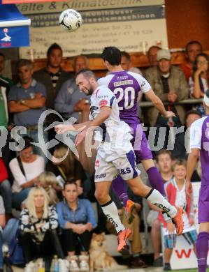 Fussball Regionalliga. SAK gegen SK Auustria Klagenfurt.  Marjan Kropiunik,  (SAK), Mirnes Becirovic (Austria Klagenfurt). Welzenegg, am 22.8.2014.
Foto: Kuess
---
pressefotos, pressefotografie, kuess, qs, qspictures, sport, bild, bilder, bilddatenbank