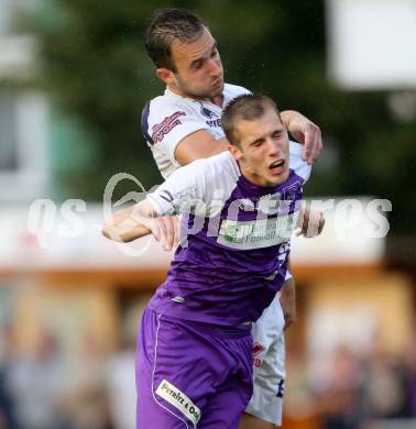 Fussball Regionalliga. SAK gegen SK Auustria Klagenfurt. Murat Veliu,  (SAK), Patrik Eler (Austria Klagenfurt). Welzenegg, am 22.8.2014.
Foto: Kuess
---
pressefotos, pressefotografie, kuess, qs, qspictures, sport, bild, bilder, bilddatenbank