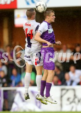 Fussball Regionalliga. SAK gegen SK Auustria Klagenfurt.  Aleksandar Kocic, (SAK), Patrik Eler  (Austria Klagenfurt). Welzenegg, am 22.8.2014.
Foto: Kuess
---
pressefotos, pressefotografie, kuess, qs, qspictures, sport, bild, bilder, bilddatenbank