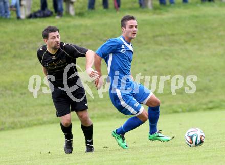 Fussball. Kaerntner Liga. Koettmannsdorf gegen ASV. Christian Sablatnig (Koettmannsdorf), Martin Salentinig (ASV). Koettmannsdorf, 24.8.2014.
Foto: Kuess
---
pressefotos, pressefotografie, kuess, qs, qspictures, sport, bild, bilder, bilddatenbank