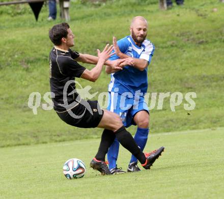 Fussball. Kaerntner Liga. Koettmannsdorf gegen ASV. Christoph Pibal (Koettmannsdorf), Stephan Mathias Stueckler (ASV). Koettmannsdorf, 24.8.2014.
Foto: Kuess
---
pressefotos, pressefotografie, kuess, qs, qspictures, sport, bild, bilder, bilddatenbank