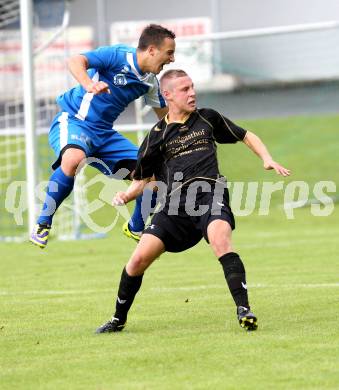 Fussball. Kaerntner Liga. Koettmannsdorf gegen ASV. Mathias Tschofen (Koettmannsdorf), Vahid Muharemovic (ASV). Koettmannsdorf, 24.8.2014.
Foto: Kuess
---
pressefotos, pressefotografie, kuess, qs, qspictures, sport, bild, bilder, bilddatenbank