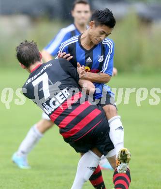 Fussball 2. KLasse D. Tainach gegen St. Paul. Johannes Schiffer, (Tainach),  Daniel Felix Perlinger  (St. Paul). Tainach, am 23.8.2014.
Foto: Kuess
---
pressefotos, pressefotografie, kuess, qs, qspictures, sport, bild, bilder, bilddatenbank