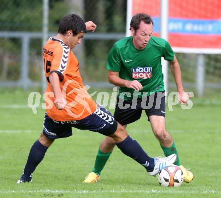 Fussball 2. KLasse C. Oberglan gegen St. Urban. Simon Gruber,  (Oberglan),  Albrecht HUber (St. Urban). Oberglan, am 16.8.2014.
Foto: Kuess
---
pressefotos, pressefotografie, kuess, qs, qspictures, sport, bild, bilder, bilddatenbank