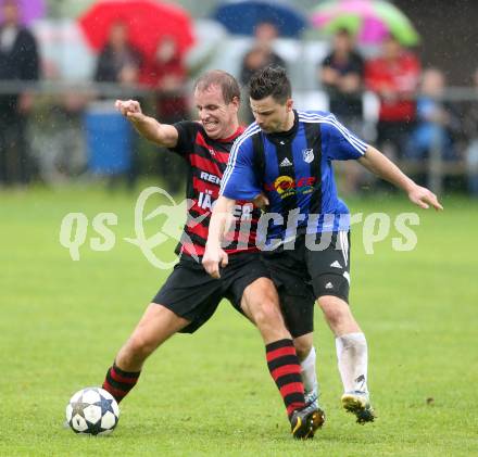 Fussball 2. KLasse D. Tainach gegen St. Paul. Manfred Orgl, (Tainach), Primoz Urlep  (St. Paul). Tainach, am 23.8.2014.
Foto: Kuess
---
pressefotos, pressefotografie, kuess, qs, qspictures, sport, bild, bilder, bilddatenbank