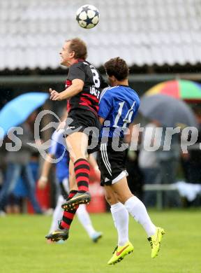 Fussball 2. KLasse D. Tainach gegen St. Paul. Markus Valentin Santer, (Tainach), Primoz Urlep  (St. Paul). Tainach, am 23.8.2014.
Foto: Kuess
---
pressefotos, pressefotografie, kuess, qs, qspictures, sport, bild, bilder, bilddatenbank