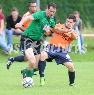 Fussball 2. KLasse C. Oberglan gegen St. Urban.  Latif Bisanovic,  (Oberglan),  August Regenfelder (St. Urban). Oberglan, am 16.8.2014.
Foto: Kuess
---
pressefotos, pressefotografie, kuess, qs, qspictures, sport, bild, bilder, bilddatenbank