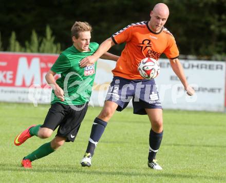 Fussball 2. KLasse C. Oberglan gegen St. Urban. Philip Gastinger, (Oberglan),  Thomas Scheiber  (St. Urban). Oberglan, am 16.8.2014.
Foto: Kuess
---
pressefotos, pressefotografie, kuess, qs, qspictures, sport, bild, bilder, bilddatenbank