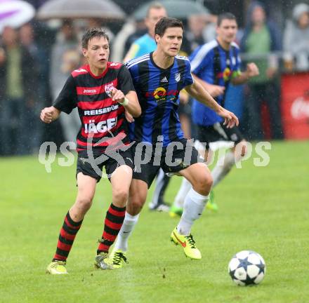 Fussball 2. KLasse D. Tainach gegen St. Paul. Markus Valentin Santer, (Tainach), Maximilian Arno Polli  (St. Paul). Tainach, am 23.8.2014.
Foto: Kuess
---
pressefotos, pressefotografie, kuess, qs, qspictures, sport, bild, bilder, bilddatenbank