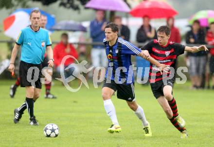 Fussball 2. KLasse D. Tainach gegen St. Paul. Kevin Trauntschnig, (Tainach), Maximilian Arno Polli (St. Paul). Tainach, am 23.8.2014.
Foto: Kuess
---
pressefotos, pressefotografie, kuess, qs, qspictures, sport, bild, bilder, bilddatenbank