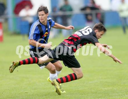 Fussball 2. KLasse D. Tainach gegen St. Paul. Markus Valentin Santer,  (Tainach), Maximilian Arno Polli (St. Paul). Tainach, am 23.8.2014.
Foto: Kuess
---
pressefotos, pressefotografie, kuess, qs, qspictures, sport, bild, bilder, bilddatenbank