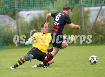 Fussball 2. KLasse D. Tainach gegen St. Paul. Andreas Philipp,  (Tainach), Martin Alexander Lippitz (St. Paul). Tainach, am 23.8.2014.
Foto: Kuess
---
pressefotos, pressefotografie, kuess, qs, qspictures, sport, bild, bilder, bilddatenbank