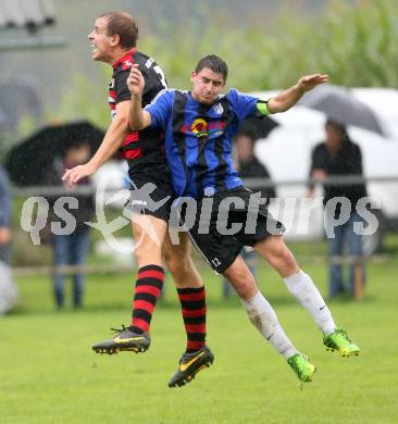 Fussball 2. KLasse D. Tainach gegen St. Paul. Joachim Viertlmayr, (Tainach), Primoz Urlep (St. Paul). Tainach, am 23.8.2014.
Foto: Kuess
---
pressefotos, pressefotografie, kuess, qs, qspictures, sport, bild, bilder, bilddatenbank